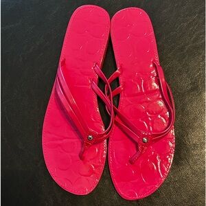Patent leather embossed flip flops.